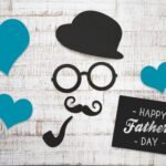 Charming Father's Day card with vintage elements on a wooden background, perfect for celebrating dads.